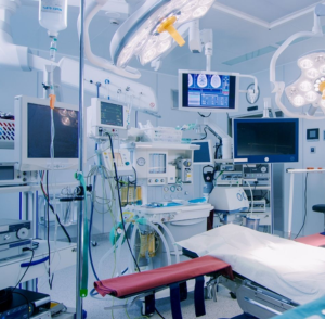 A hospital room equipped with cutting-edge medical equipments and latest lightings.