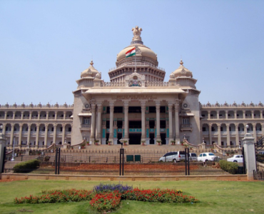 Bangalore, Karnataka assembly building with the Indian flag and our national symbol.